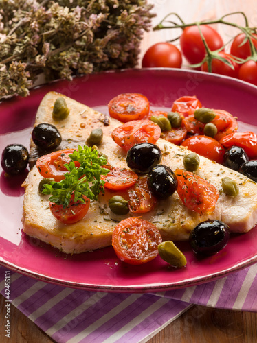 swordfish with tomatoes capers and olive,traditional recipe