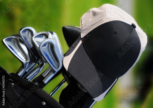casquette et club de golf