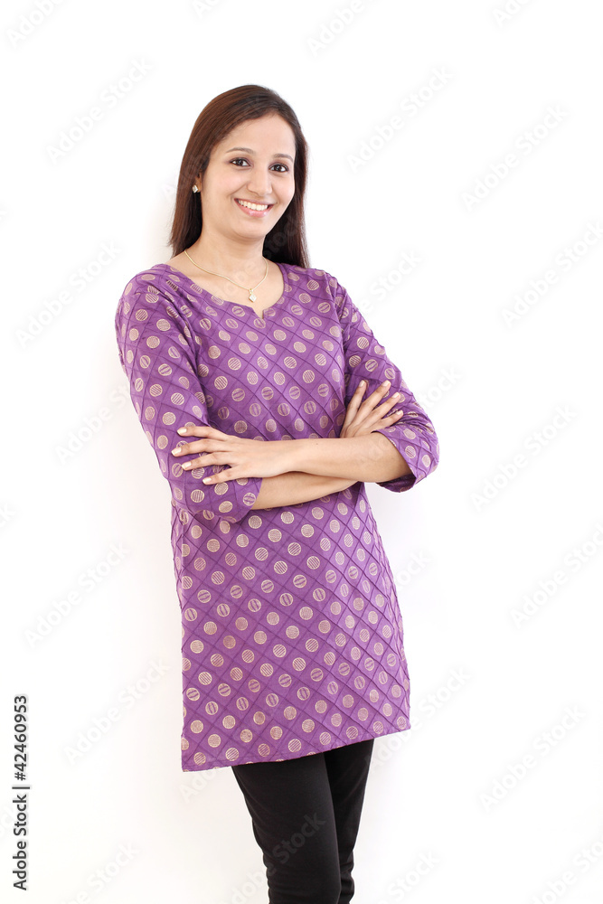 Arms crossed Indian woman against white background Arms crossed Indian woman against white background