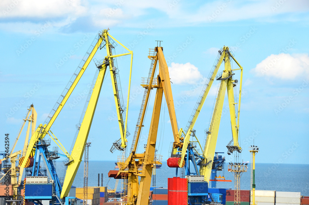 Port cargo crane over blue sky background Port cargo crane over blue sky background