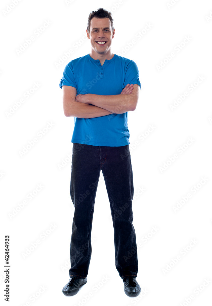 Full shot of a guy with crossed arms