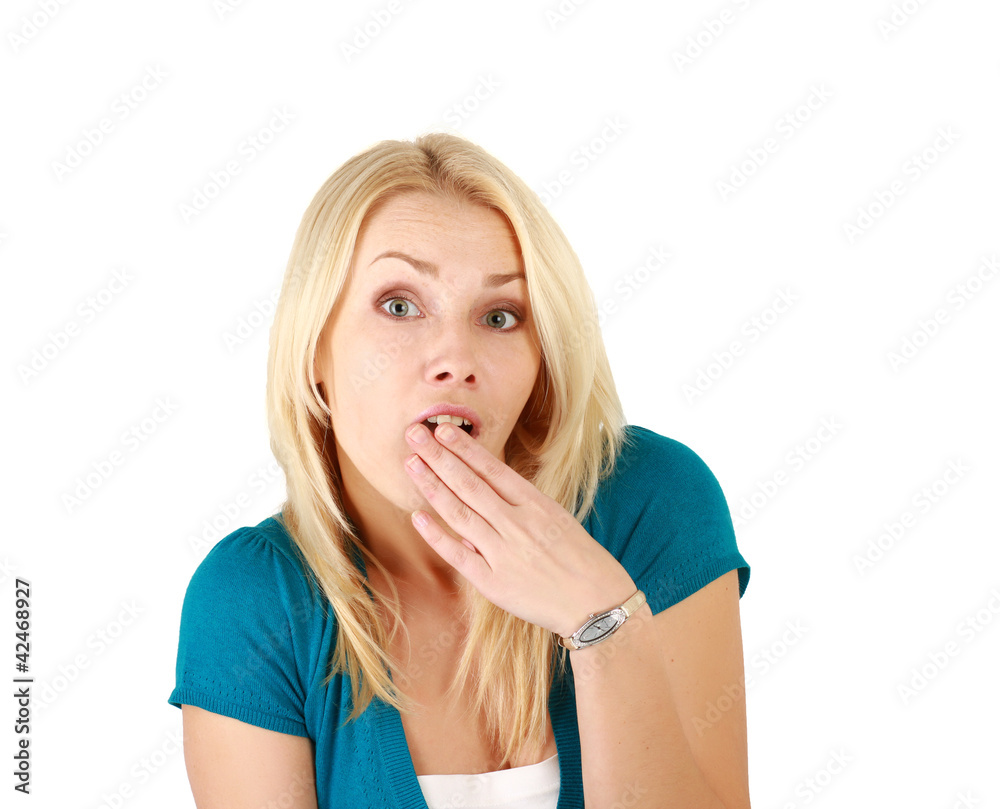 A smiling woman touching her face, isolated on white background A smiling woman touching her face, isolated on white background