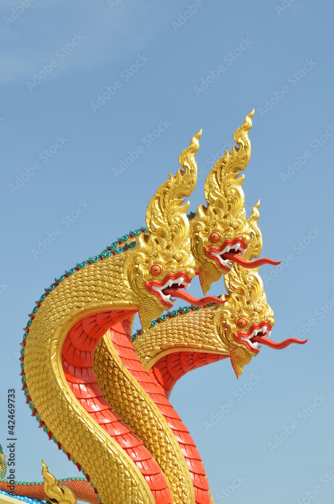 Fototapeta premium Thai dragon, King of Naga statue with three heads in Thailand