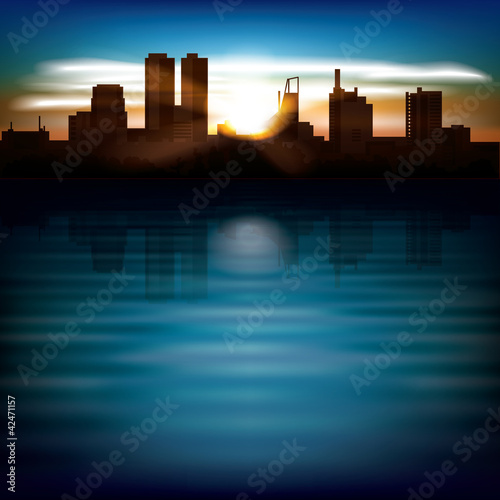 abstract night background with silhouette of city