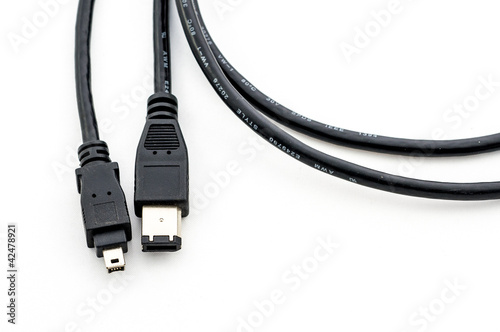 A firewire plug over a white background