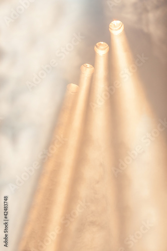 Row of spotlights illuminating a stage performance