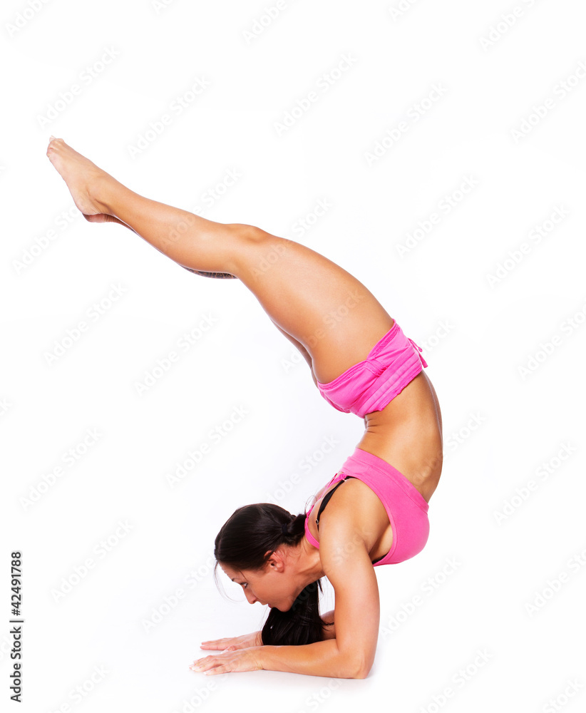 Portrait of joga trainer doing exercise in gym Portrait of joga trainer doing exercise in gym