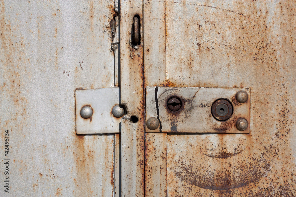 Old padlock on garage collars