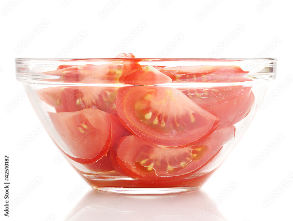 Diced tomatoes in glass bowl isolated on white Diced tomatoes in glass bowl isolated on white