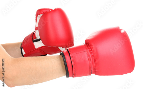 Red boxing gloves on hands isolated on white © Africa Studio