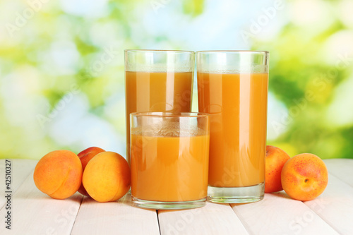 glasses of apricot juice  and fresh apricots