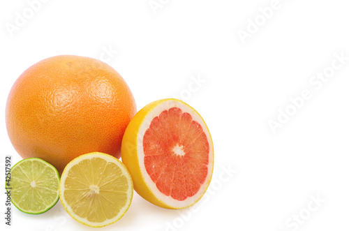 Image of a fresh whole lime  lemon and orange isolated on white
