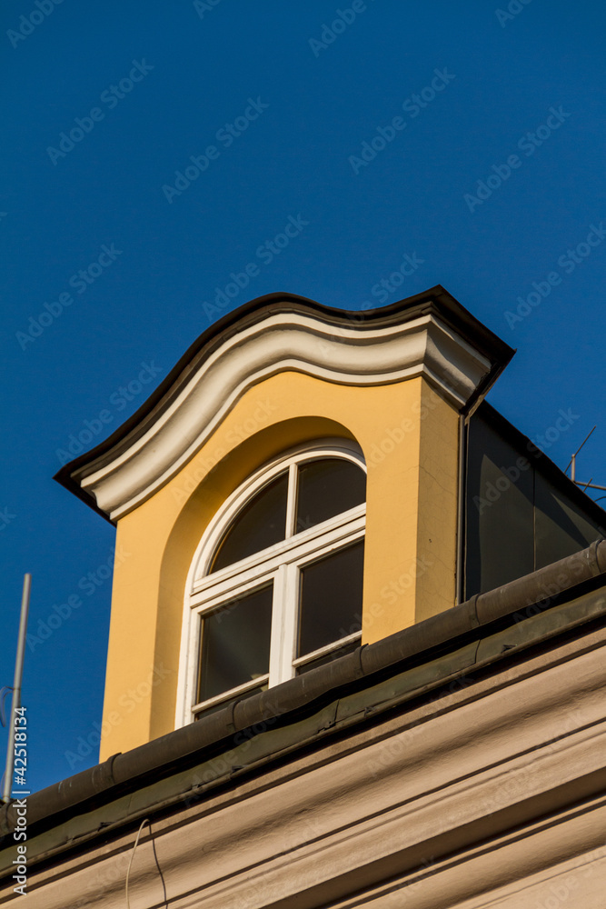 Beautiful facade of old town house in Krakow, Poland Beautiful facade of old town house in Krakow, Poland