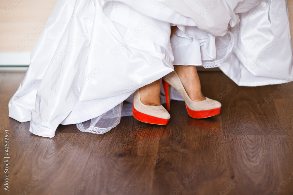 closeup photo of beautiful bride's shoes closeup photo of beautiful bride's shoes