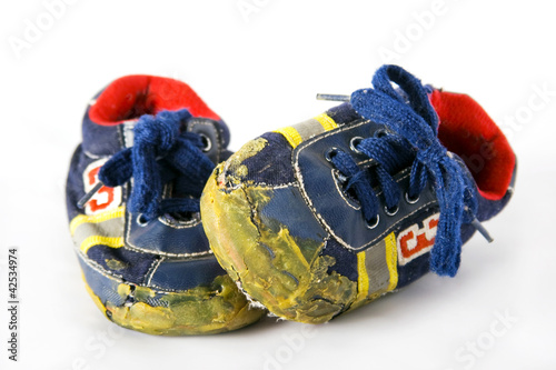 Kids old scruffy shoe