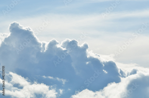 classic cloudscape. Blue sky with ornamental clouds