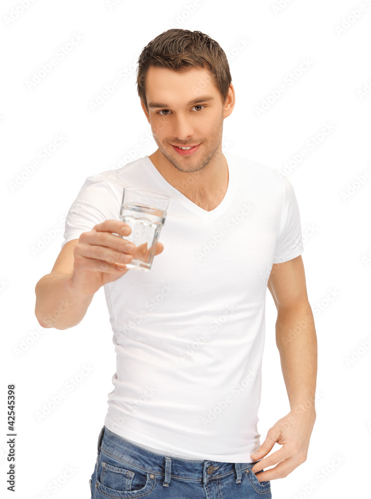 man in white shirt with glass of water man in white shirt with glass of water