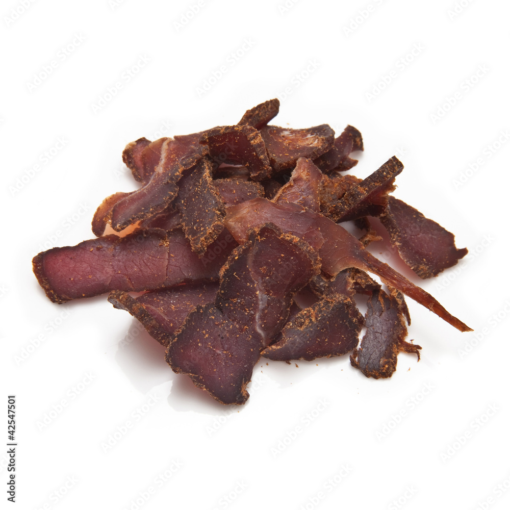 Biltong-(beef jerky) isolated on a white studio background.