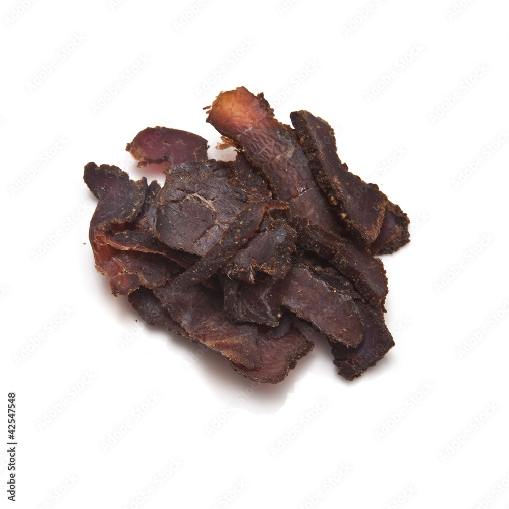 Biltong-(beef jerky) isolated on a white studio background.