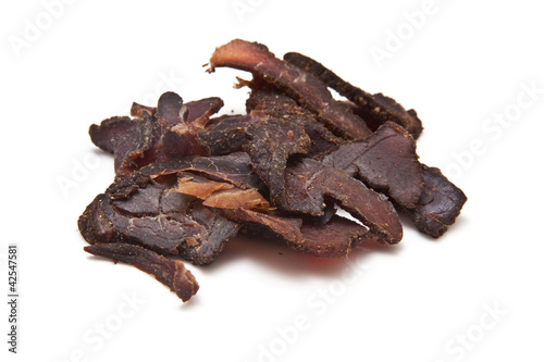 Biltong-(beef jerky) isolated on a white background.
