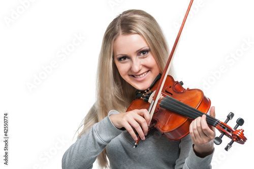 young smiling girl playing the violin