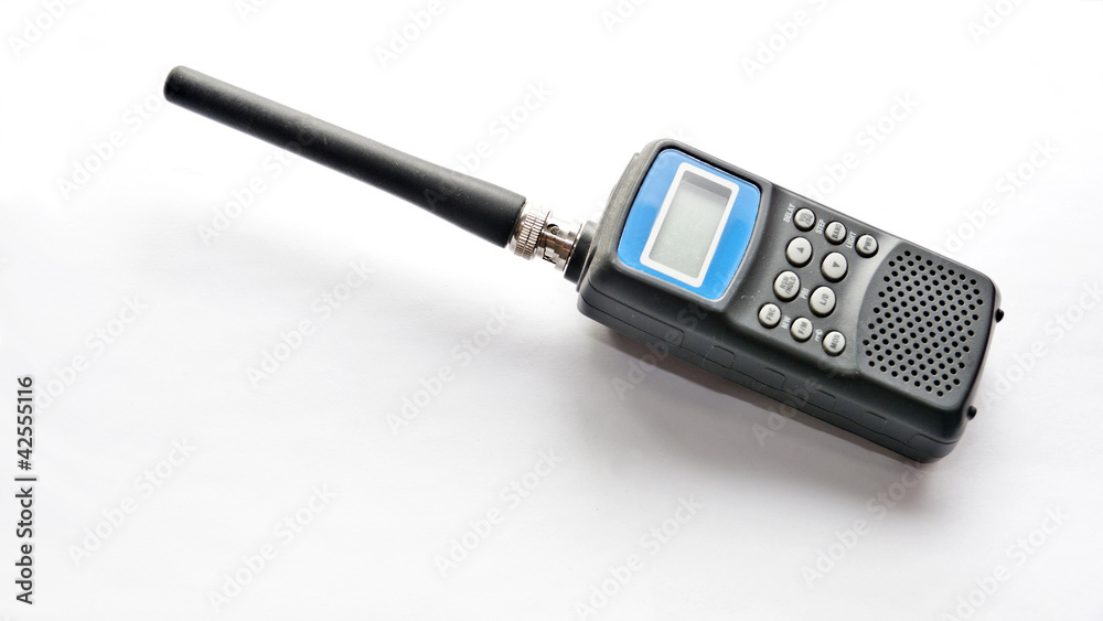 Amateur walky talkie radio on a white surface Amateur walky talkie radio on a white surface