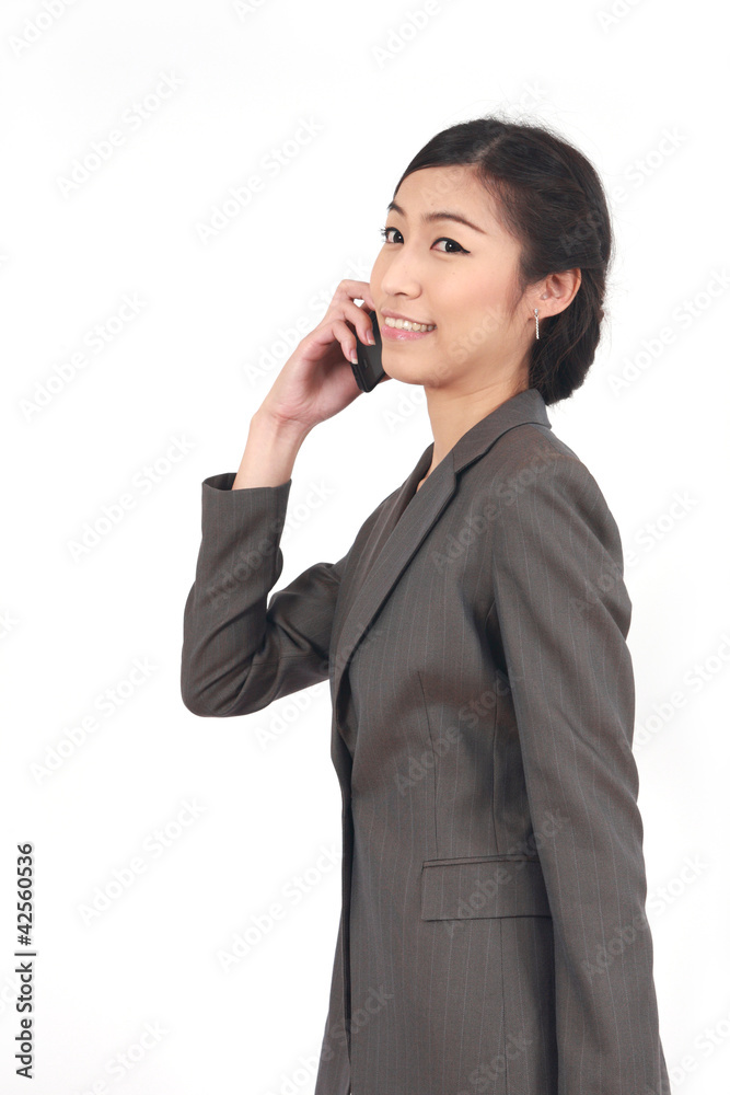 Asian Business woman talking on smart phone Asian Business woman talking on smart phone