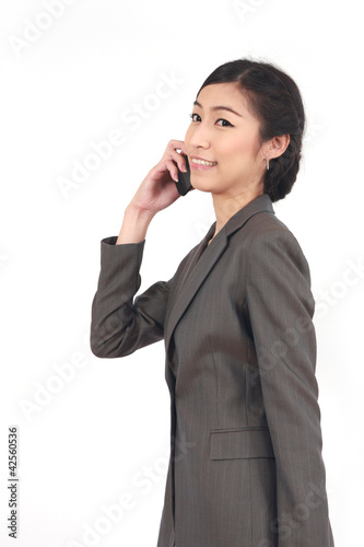 Asian Business woman talking on smart phone