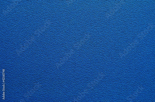 textureof blue cloth on the wall