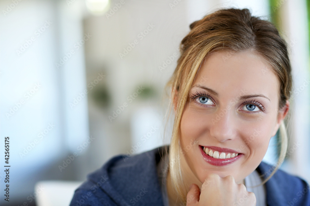 Portrait of beautiful teen girl with blue eyes