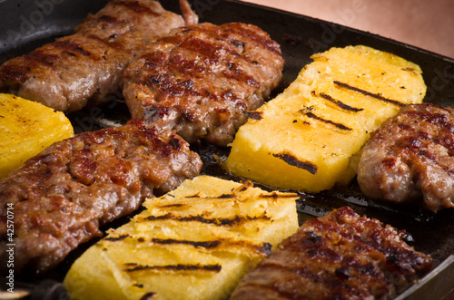 Sausage and sliced of polenta 