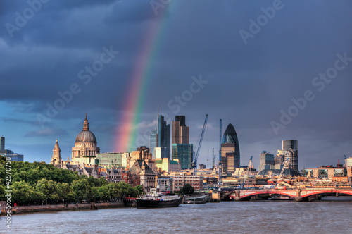 London Financial District Skyline over Thames with rainbow