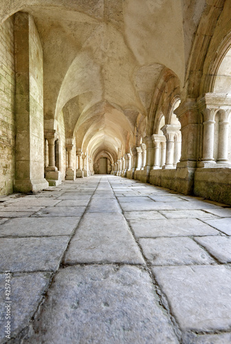 Old colonnaded closter in the Abbaye de Fontenay