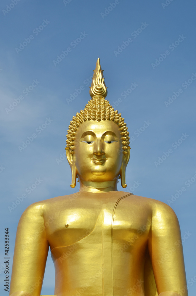 Golden Buddha statue at Wat Muang in Angthong, Thailand