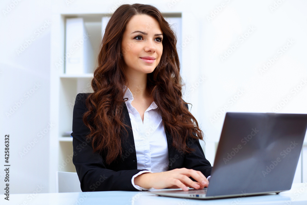 Young busines woman with notebook Young busines woman with notebook