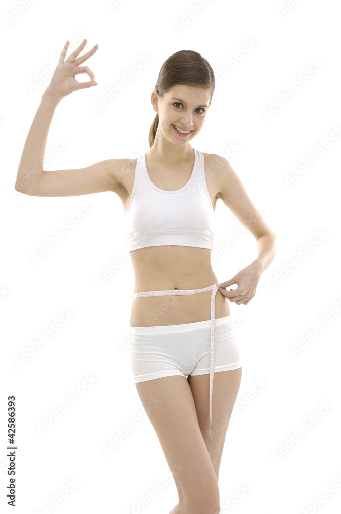 Sexy woman measuring perfect shape of beautiful thigh. Sexy woman measuring perfect shape of beautiful thigh.