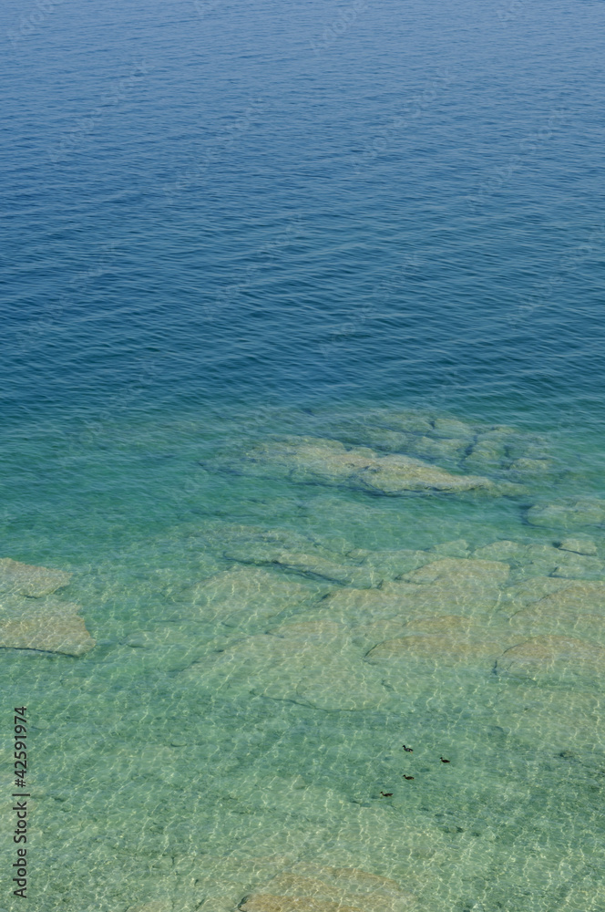 Transparent waters of Garda Lake, Italy Transparent waters of Garda Lake, Italy