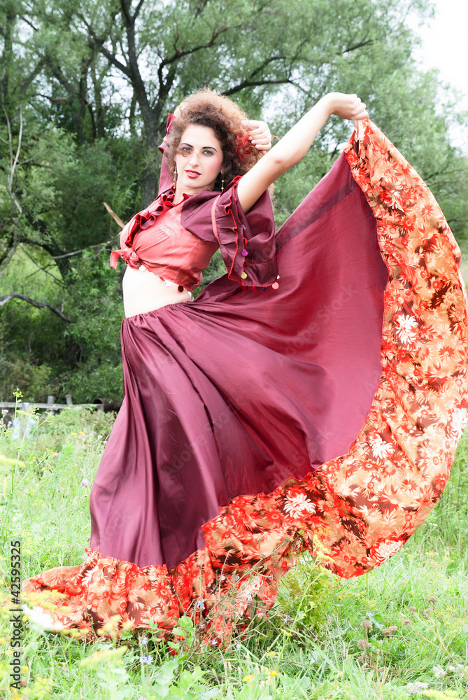 beautiful gypsy girl in red dress