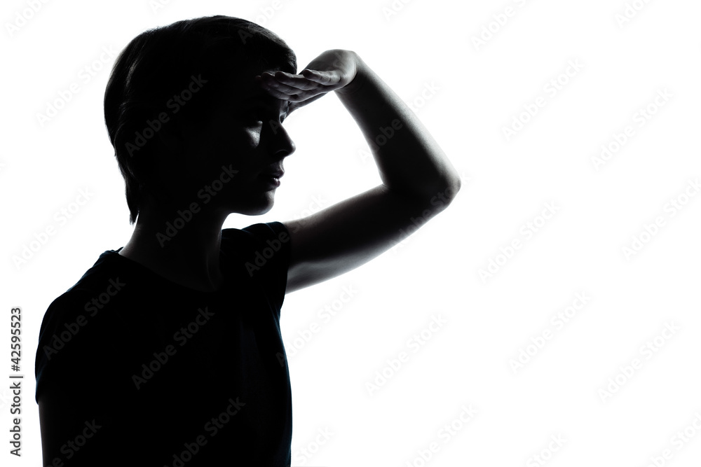 one young teenager boy or girl looking foward silhouette