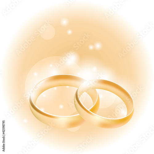 wedding rings on an abstract background