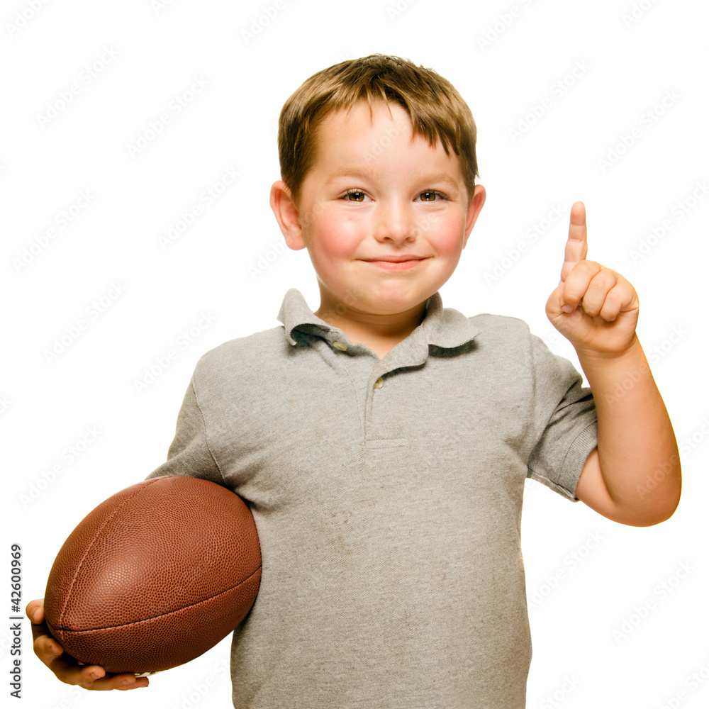 Child with football showing that he's Number 1 Child with football showing that he's Number 1