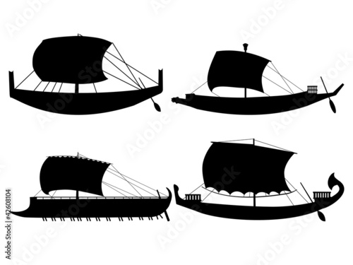set of silhouettes of ancient sail boats