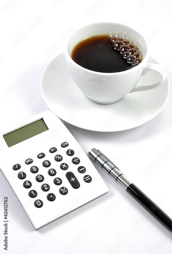 Desk with a calculator and pen Desk with a calculator and pen