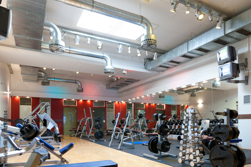 Fototapeta premium Fitnessstudio - Geräte und Gewichte