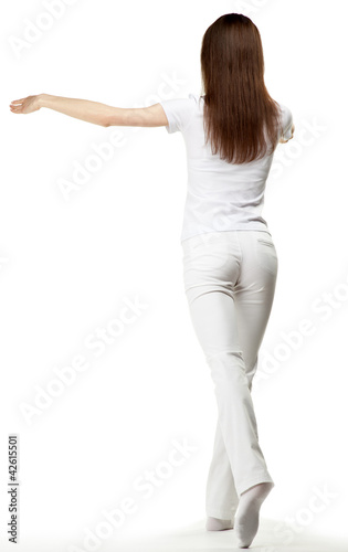 Beautiful girl in white dancing