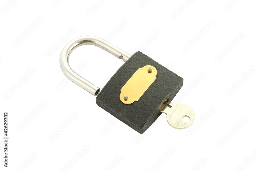 Old black padlock with key close on white background. Old black padlock with key close on white background.