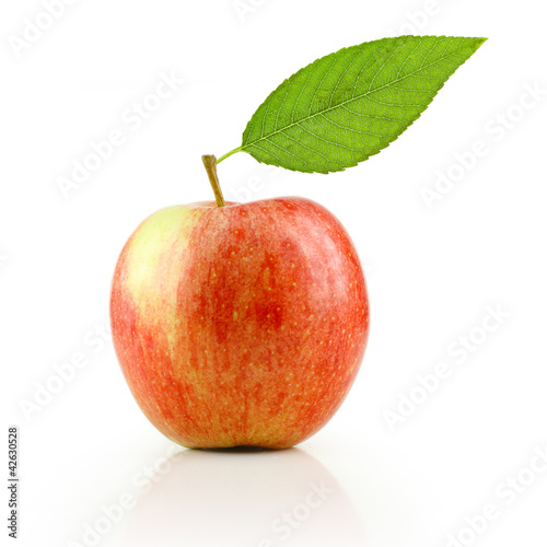 Apple with green leaf