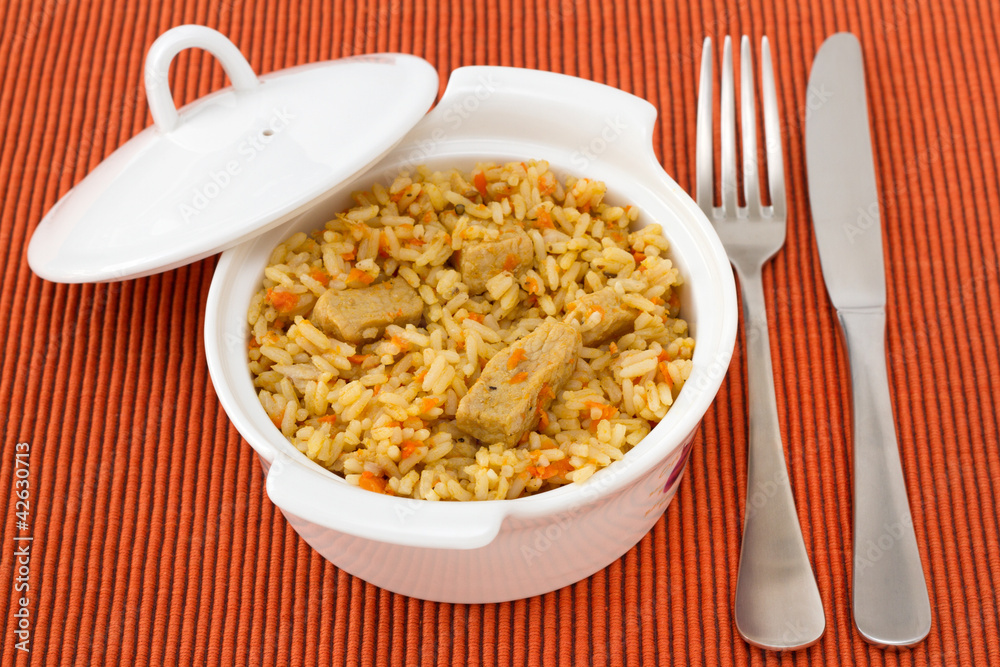 rice with pork and vegetables in the bowl rice with pork and vegetables in the bowl