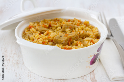 rice with pork and vegetables in the bowl