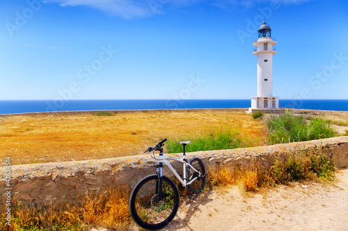 bicycle on Balearic Formentera Barbaria Lighthouse photo